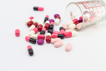 the pile of pills and capsules white background concept Health