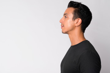 Closeup profile view of handsome Hispanic man