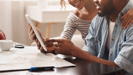 Couple planning vacation trip, searching places to visit