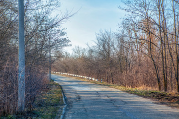 empty asphalt winding country road 