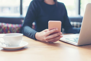 Businessman using smart phone and tablet computer to work with financial data in the work space. Business Concept