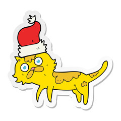 sticker of a cartoon cat wearing christmas hat