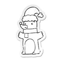 distressed sticker of a cartoon bear wearing christmas hat