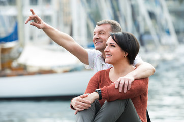 Happy mature couple outdoors.