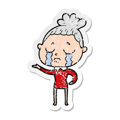 distressed sticker of a cartoon crying woman