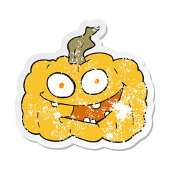 retro distressed sticker of a cartoon pumpkin