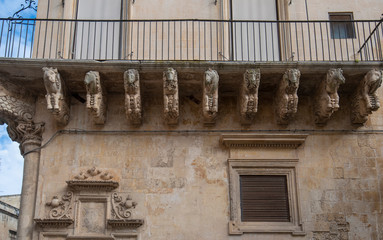 Lecce, Puglia, Italy - Medieval street and historical center in the old town. View and detail of an...