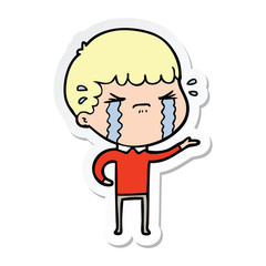 Obraz premium sticker of a cartoon man crying