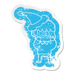 happy cartoon distressed sticker of a man wearing santa hat