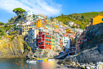 Riomaggiore of Cinque Terre, Italy - Traditional fishing village in La Spezia, situate in coastline of Liguria of Italy. Riomaggiore is one of the five Cinque Terre travel attractions.