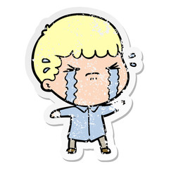 distressed sticker of a cartoon man crying