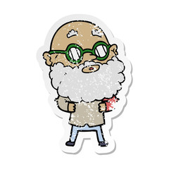 distressed sticker of a cartoon curious man with beard and glasses