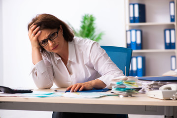 Female employee in budget planning concept 