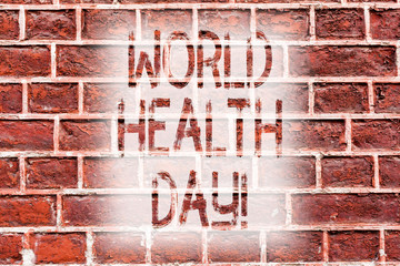 Handwriting text writing World Health Day. Conceptual photo Special Date for Healthy Activities Care Prevention Brick Wall art like Graffiti motivational call written on the wall