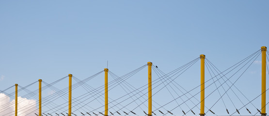 yellow metal posts with anchor support