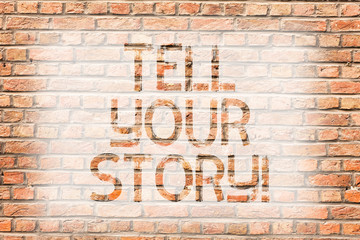 Fototapeta na wymiar Text sign showing Tell Your Story. Business photo text expressing your feelings Narrating writing your biography Brick Wall art like Graffiti motivational call written on the wall