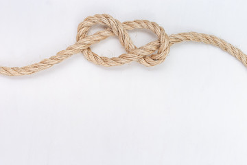 Figure-eight knot or Savoy knot on white background. Copy space.