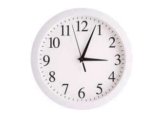 Wall clock with a round white dial.