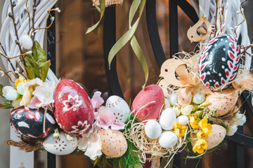 ester decorations close up branch of willow with bunnies