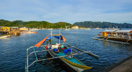 Small boats at jetty in Coron Island