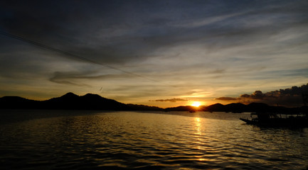 Orange sunset landscape of Coron Island