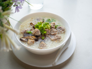 Rice soup on white table.