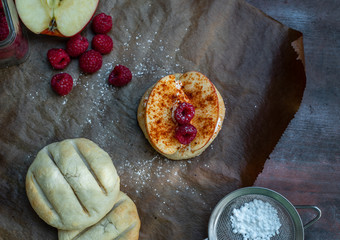 Polish cuisine - crispy, baked bread with yogurt, cinnamon, chilli, apples and raspberries