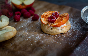 Polish cuisine - crispy, baked bread with yogurt, cinnamon, chilli, apples and raspberries
