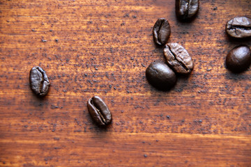 coffee beans on dark wooden background