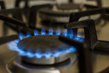 Blue flame of a gas stove.