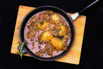 Goulash, beef, pork stew in cast iron pan, top view, close up - Image