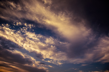 Naklejka na ściany i meble Beautiful sunrise and dramatic clouds on the sky