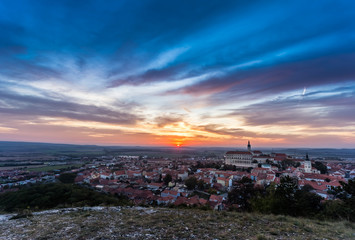 Colorful autumn Sunset over the Mikulov city, Moravia, Czech Republic