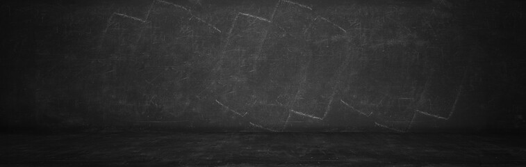 black studio with chalkboard and blackboard wall texture background