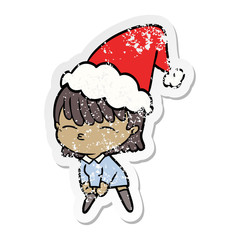 distressed sticker cartoon of a woman wearing santa hat