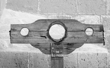 Detail view on a wooden Guillotine with Lock. From the Museum of the old prison of Malta.