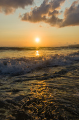 Amazing sea sunset, the sun, waves, clouds