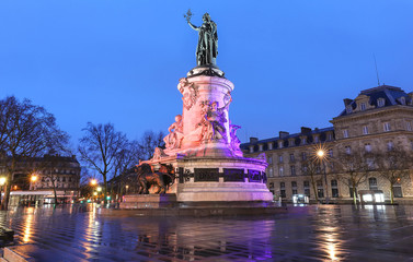The statue of the Republic in the early rainy morning , Paris, France.
