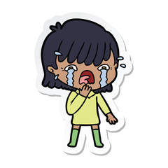 sticker of a cartoon girl crying