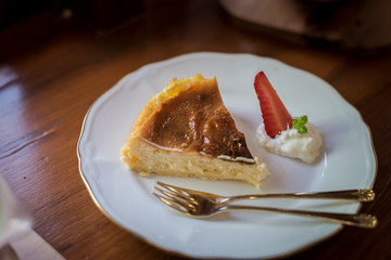 strawberry cheese cake with silver spoons on the table, japan dessert.