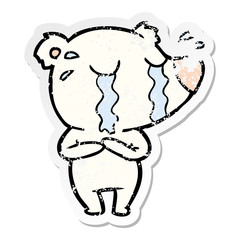 distressed sticker of a cartoon crying polar bear