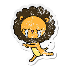 distressed sticker of a crying cartoon lion