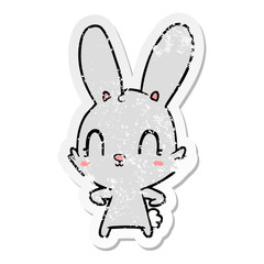 distressed sticker of a cute cartoon rabbit