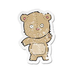 retro distressed sticker of a cartoon teddy bear