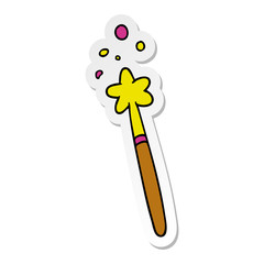 sticker cartoon doodle of a magic wand
