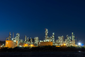 Fototapeta premium Petrochemical Industrial. Oil refinery and Oil industry at twilight.