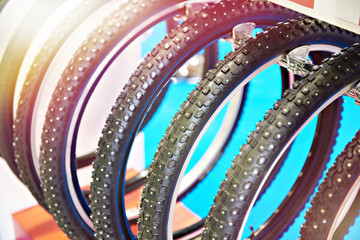 Bicycle snow tire with metal studs in store