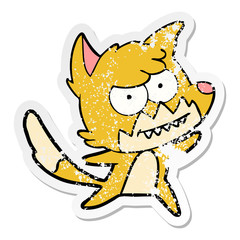 distressed sticker of a cartoon grinning fox