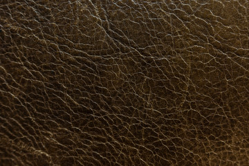Aged brown leather texture shallow focus