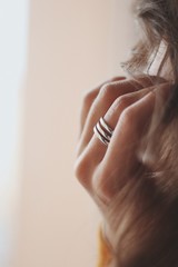 Fototapeta premium complex precious ring on the girl's hand